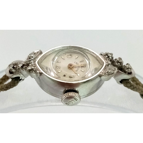 506 - A Vintage 14K White Gold and Diamond Lady Elgin Mechanical Cocktail Watch. Rope bracelet. 14k gold o... 