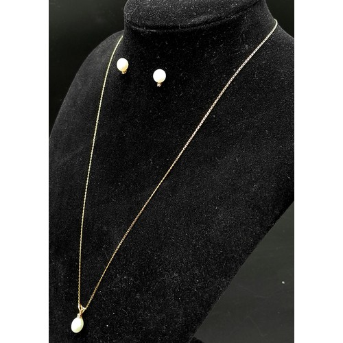 584 - An Unworn 9 Carat Yellow Gold Pearl and Diamond Set Necklace & Matching Earrings. 46cm Length Chain,... 