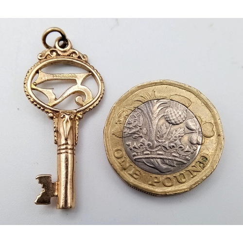 12 - A 9K Yellow Gold 21 Key Pendant. 4cm. 2.77g weight.