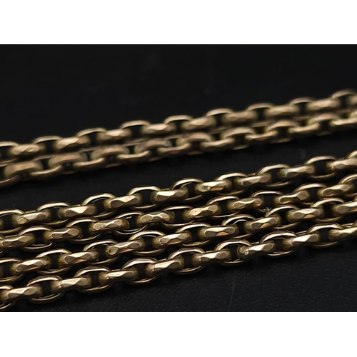 33 - An Antique 9K Yellow Gold Long Pocket Watch Chain with a Hanging 9K Yellow Gold Fob with Chalcedony ... 