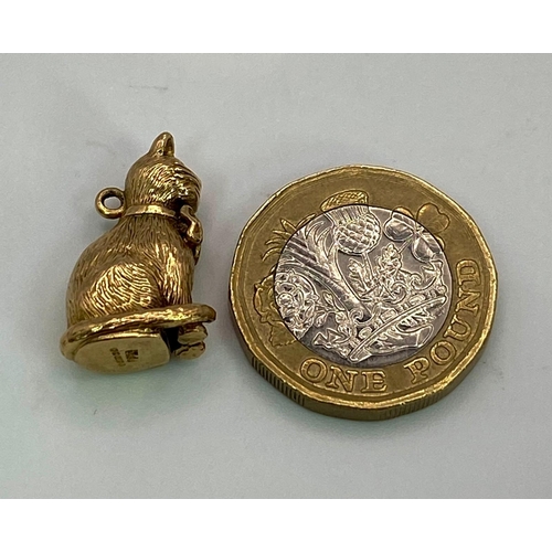 23 - A Vintage 9K Yellow Gold Sitting Pussy Pendant/Charm. 20mm. 5.62g weight.