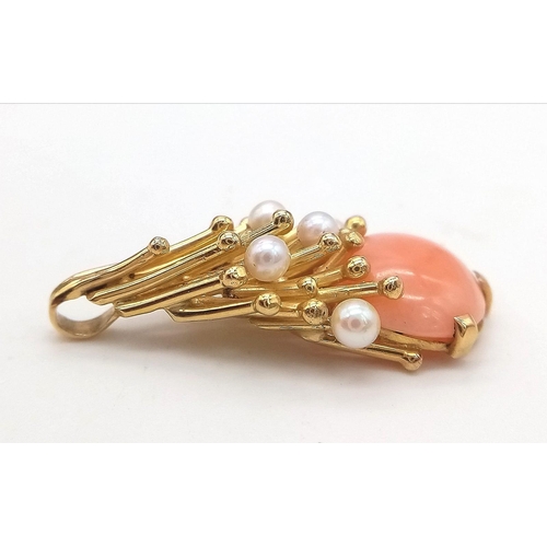 38 - An 18K Yellow Gold (tested) Sea-Burst Coral and Pearl Pendant. A beautiful oval coral splashed with ... 