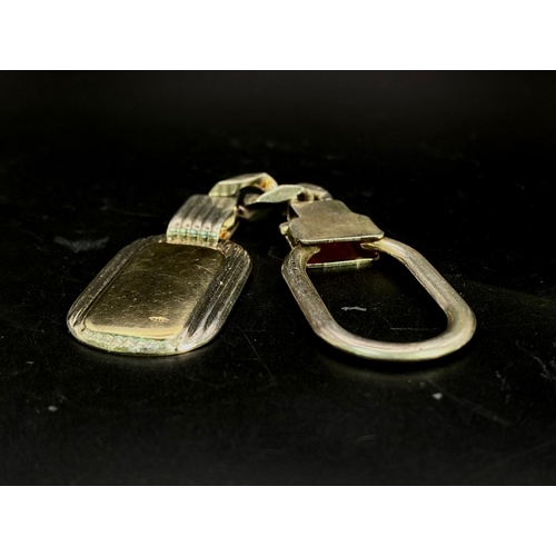 46 - A Vintage Sterling Silver and 18K Gold Key Ring. Constructed from different parts of previous jewell... 