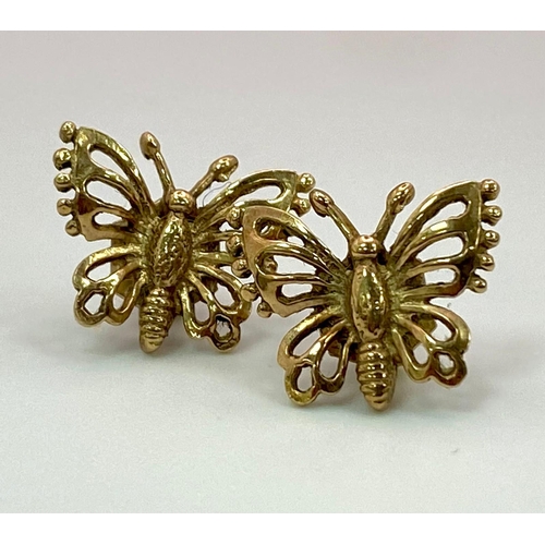 582 - A Pair of 9K Yellow Gold Decorative Butterfly Stud Earrings. 
2.1g total weight.