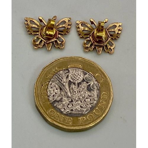 582 - A Pair of 9K Yellow Gold Decorative Butterfly Stud Earrings. 
2.1g total weight.