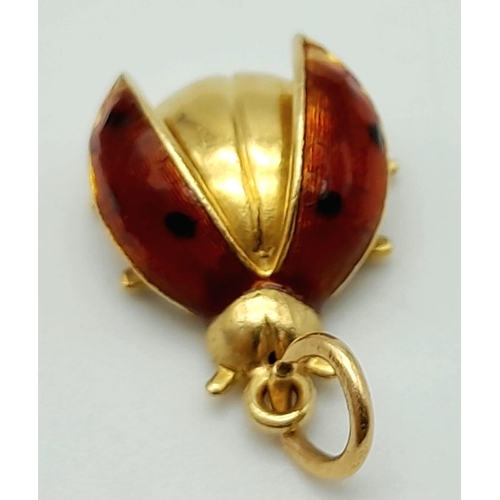 60 - An 18K Yellow Gold and Enamel Ladybird Pendant. 2cm. 2.05g total weight.