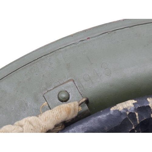 55 - 1943 Dated British MK II Helmet. Original Paint. Makers Marked RO & CO. With original chin strap... 