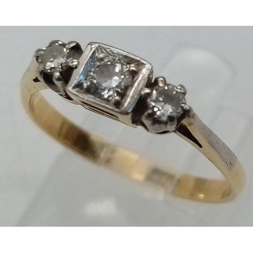 221 - An 18k white gold diamond halo cluster ring with engraved shoulders. 3.2g total weight.  Size N 1/2.... 