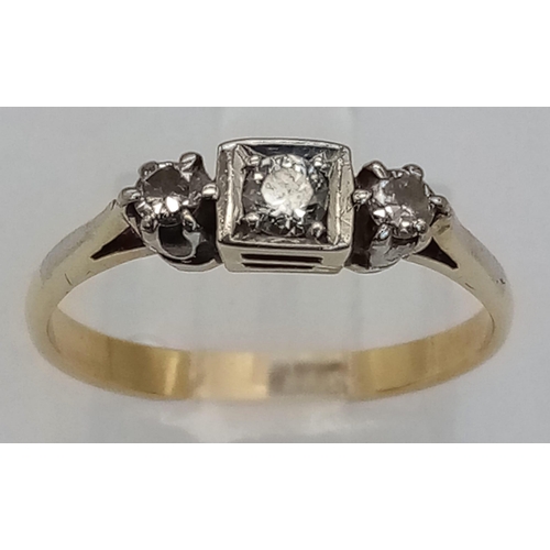 221 - An 18k white gold diamond halo cluster ring with engraved shoulders. 3.2g total weight.  Size N 1/2.... 