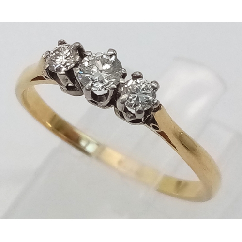 228 - An 18k yellow gold diamond and pearl ring. 2.4g total weight.  size L 1/2 (pearls: 2mm/dia:0.01ct).