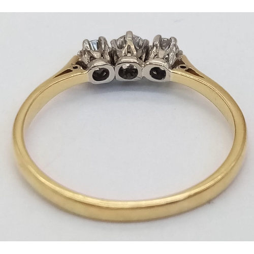 228 - An 18k yellow gold diamond and pearl ring. 2.4g total weight.  size L 1/2 (pearls: 2mm/dia:0.01ct).