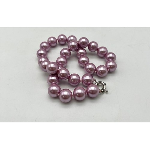 592 - A Shimmering Lavender South Sea Pearl Shell Beaded Necklace. 14mm shell beads. Necklace length - 42c... 