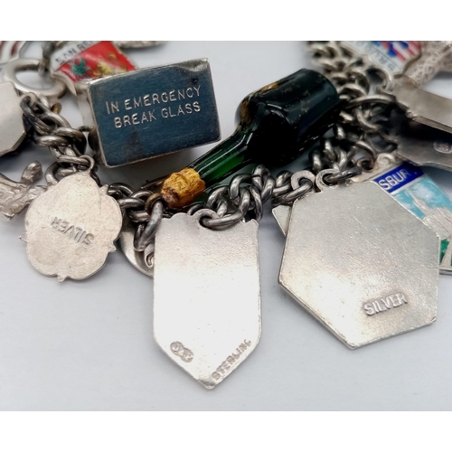 569 - Vintage Sterling Silver Charm Bracelet.
17cm in Length. Comprising 34 Silver Charms, including Count... 