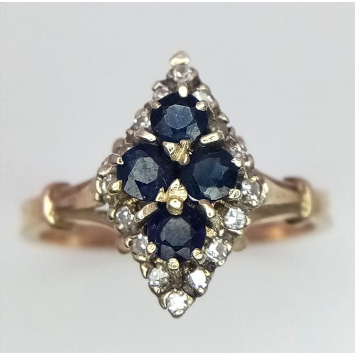 594 - A 9K YELLOW GOLD DIAMOND & SAPPHIRE RING. Size O, 3.1g total weight.