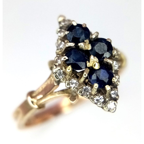 594 - A 9K YELLOW GOLD DIAMOND & SAPPHIRE RING. Size O, 3.1g total weight.