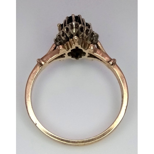 594 - A 9K YELLOW GOLD DIAMOND & SAPPHIRE RING. Size O, 3.1g total weight.