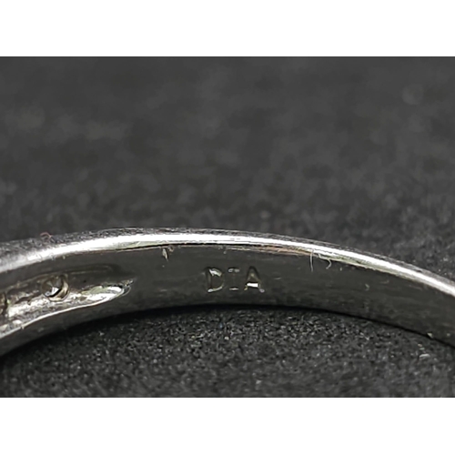 549 - A 9K WHITE GOLD DIAMOND & BLUE TOPAZ RING 3.1G SIZE O