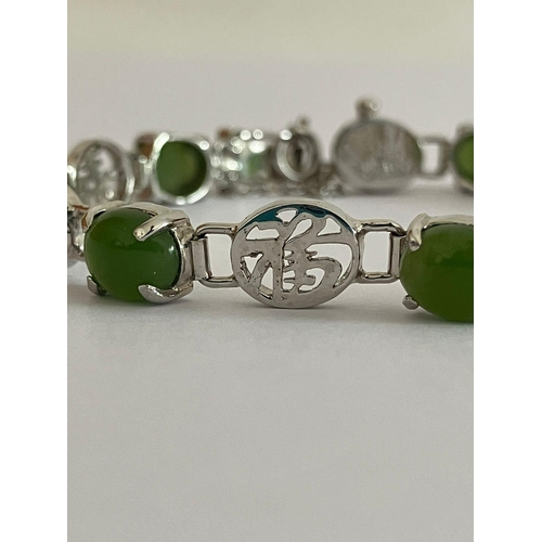 567 - SILVER and GREEN CHALCEDONY BRACELET set with SILVER CHINESE SYMBOLS Separating the gemstones. Compl... 