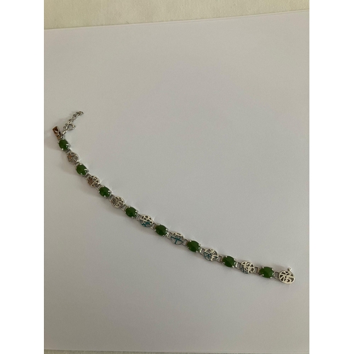 567 - SILVER and GREEN CHALCEDONY BRACELET set with SILVER CHINESE SYMBOLS Separating the gemstones. Compl... 