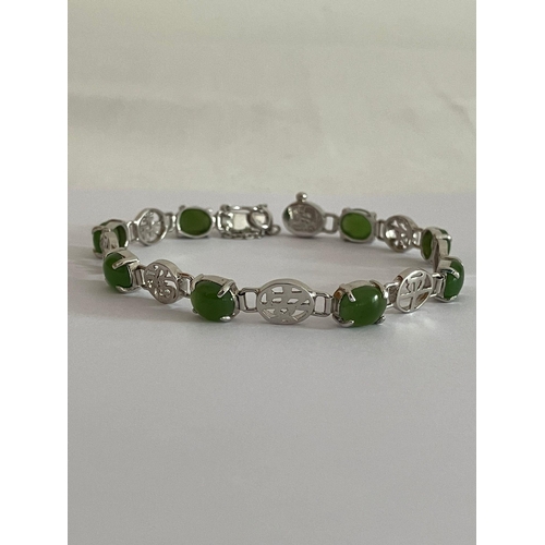 567 - SILVER and GREEN CHALCEDONY BRACELET set with SILVER CHINESE SYMBOLS Separating the gemstones. Compl... 