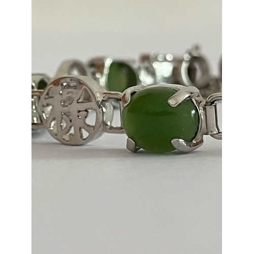 567 - SILVER and GREEN CHALCEDONY BRACELET set with SILVER CHINESE SYMBOLS Separating the gemstones. Compl... 