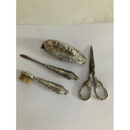 580 - Ladies antique SILVER HANDLED MANICURE/GROOMING set, together with a pair of SILVER  handled scissor... 