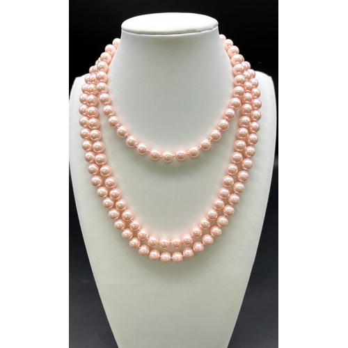 939 - A Charming Pink South Sea Pearl Shell Rope Length Necklace. Perfect for wearing in different ways. 8... 