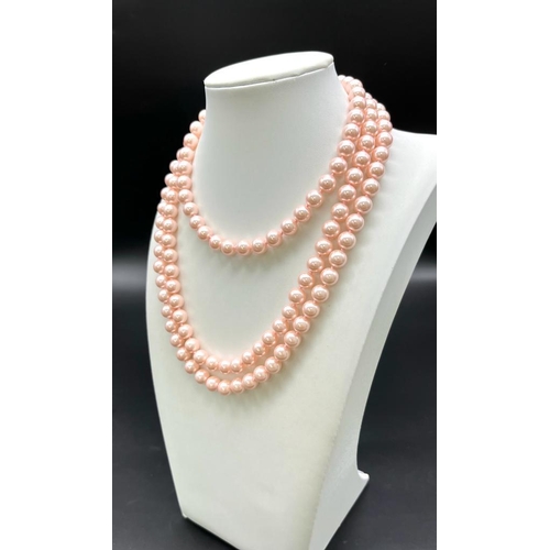 939 - A Charming Pink South Sea Pearl Shell Rope Length Necklace. Perfect for wearing in different ways. 8... 