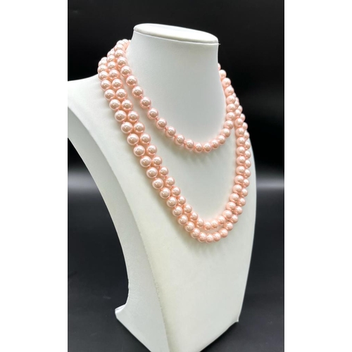 939 - A Charming Pink South Sea Pearl Shell Rope Length Necklace. Perfect for wearing in different ways. 8... 