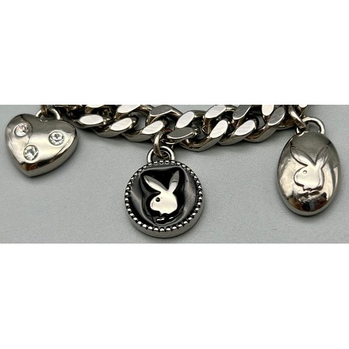 686 - A Playboy White Metal Charm Bracelet with a Playboy charm clock - in working order. 16cm