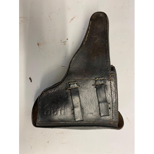 246 - A German WW2 P38 Hard Shell Holster - Waffenamt stamped on the back. ML417.