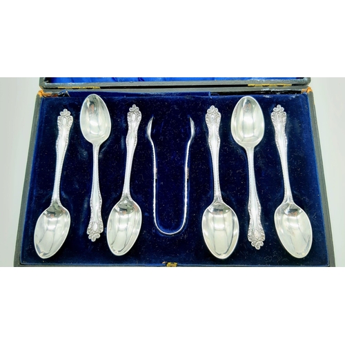 456 - An Antique Sterling Silver Teaspoon and Sugar Tong Set. Hallmarks for Sheffield 1902. Makers mark of... 