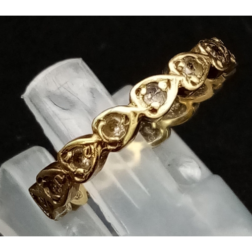 688 - A Vintage 9K Yellow Gold Heart-Shaped Band Ring. White stone decoration. Size L. 1.8g total weight.