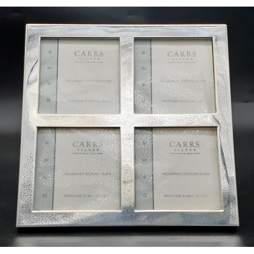 702 - A Carrs Sterling Silver Four Picture Frame. 15cm x 15cm. In very good condition, in box.