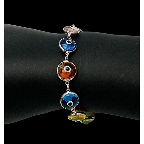 778 - Sterling Silver Lucky Eye Protection Bracelet.
Multiply coloured eyes that not only protect, but cat... 