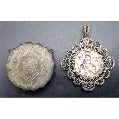 118 - TWO ITEMS: An antique silver filigree, Greek Orthodox religious pendant depicting Virgin Mary with h... 