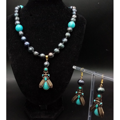 160 - A very unusual large, natural, Tahitian black pearl and turquoise necklace and earrings set, reminis... 