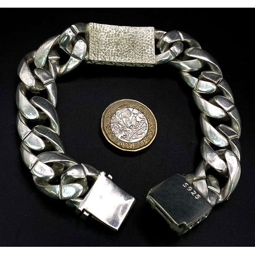 209 - A very desirable, sterling silver, probably of Buddhist significance, gents bracelet with sculls. We... 