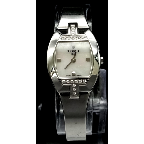 677 - A Tissot 1853 Diamond Ladies Watch. Stainless steel bracelet and case - 22mm. White dial. Two diamon... 