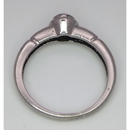 250 - A 9K White Gold Diamond Solitaire Dress Ring. 0.25ct. Size L. 
3.1g total weight. Ref: 7030