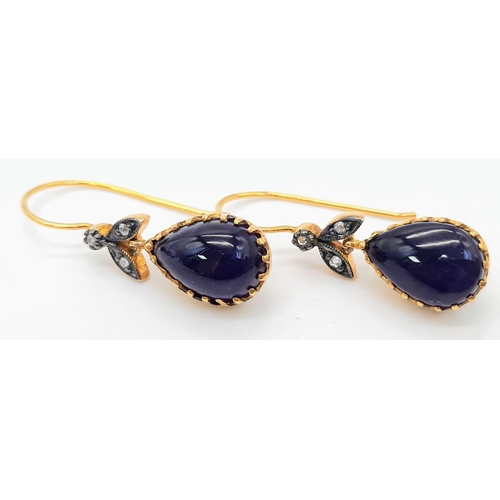 444 - A Pair of 9K Yellow Gold and Silver Amethyst Cabochon and Diamond Drop Earrings. Boxed. 5g total wei... 