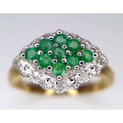 585 - A 9K Yellow Gold Vintage-Style Emerald and Diamond Lozenge-Shaped Cluster Ring. Emeralds - 0.28ctw. ... 