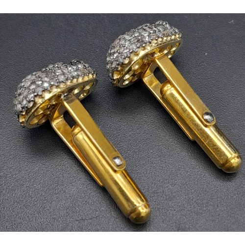 788 - A Pair of Skull Encrusted Diamond Gilded Cufflinks. 1.80ctw.
Ref: 7422