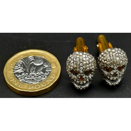 788 - A Pair of Skull Encrusted Diamond Gilded Cufflinks. 1.80ctw.
Ref: 7422