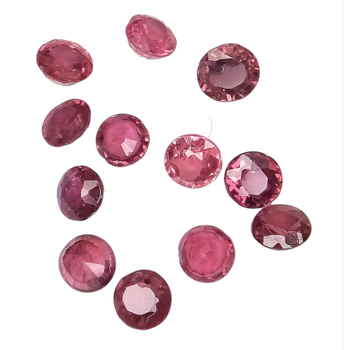 803 - A Parcel of 12 Round-Cut Unmounted Rubies. Boxed. 2.15ctw. Ref: 6947