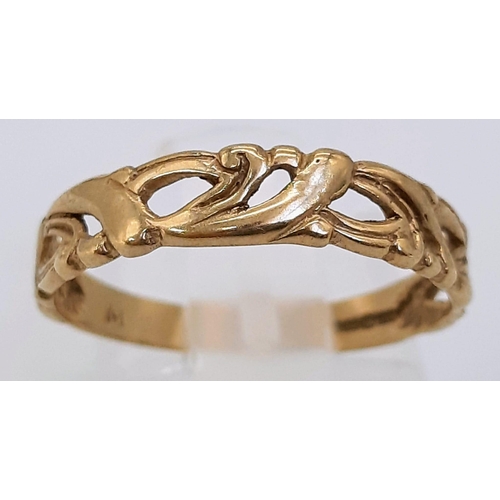 451 - A 9K Yellow Gold Decorative Pierced Band Ring. Size N. 1.23g weight.