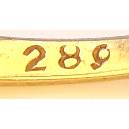 477 - A Vintage 9K Yellow Gold Diamond Ring. Seven small stones.
Size I/J. 1.15g total weight.