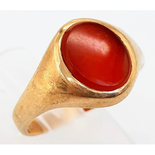 54 - A Vintage 9K Yellow Gold Carnelian Signet Ring. Oval cabochon. Size O. 3.47g total weight.