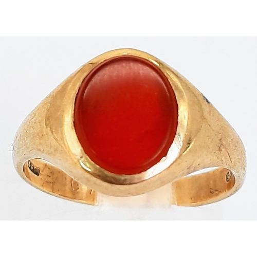 54 - A Vintage 9K Yellow Gold Carnelian Signet Ring. Oval cabochon. Size O. 3.47g total weight.