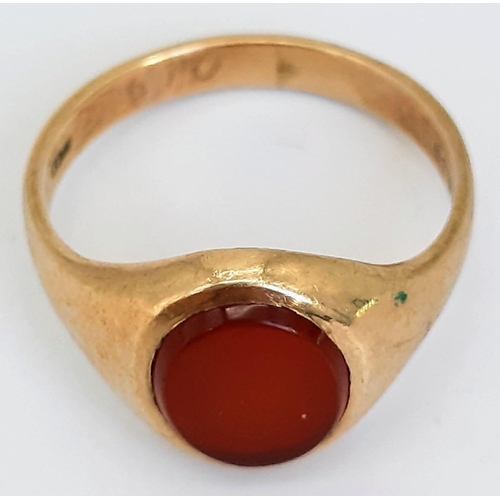 54 - A Vintage 9K Yellow Gold Carnelian Signet Ring. Oval cabochon. Size O. 3.47g total weight.